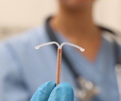 Doctor Holding an IUD Insertion