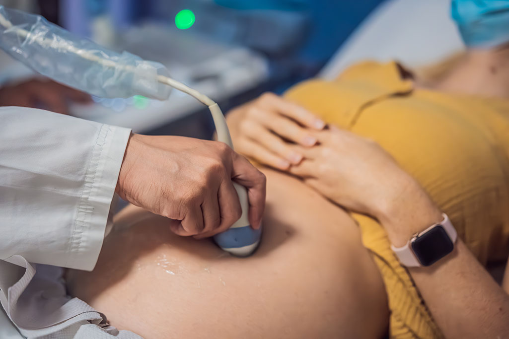 Close Up Shot Of A Doctor Performing An Ultrasound On A Pregnant Woman’s Belly Understanding The Types Of Ultrasounds